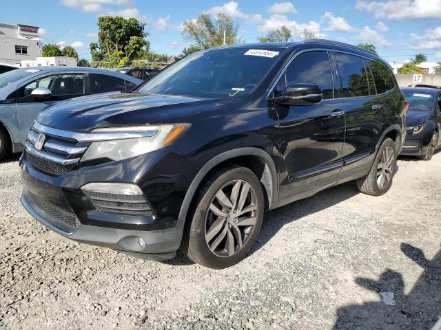 HONDA PILOT ELIT 2017 with VIN 5FNYF6H00HB055277 - Photo from auction