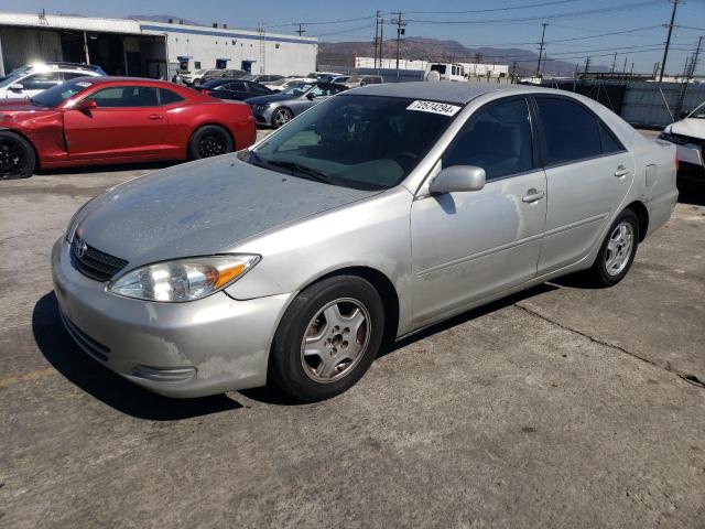 TOYOTA CAMRY LE 2003 with VIN 4T1BF32K63U557818 - Photo from auction