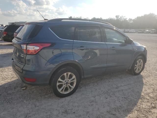 Photo 3 from auction – 2018 FORD ESCAPE SE with VIN 1FMCU0GD5JUA69086