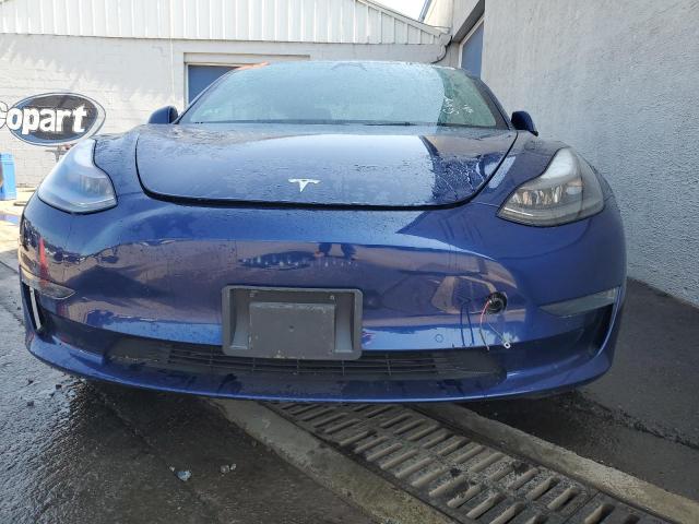 Photo 5 from auction – 2022 TESLA MODEL 3 with VIN 5YJ3E1EA7NF287402