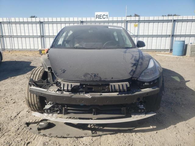 Photo 5 from auction – 2021 TESLA MODEL 3 with VIN 5YJ3E1EA3MF027738