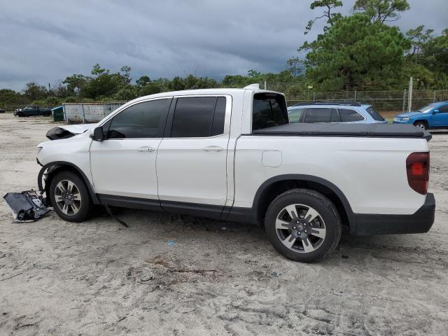 Photo 2 from auction – 2023 HONDA RIDGELINE with VIN 5FPYK3F56PB037865
