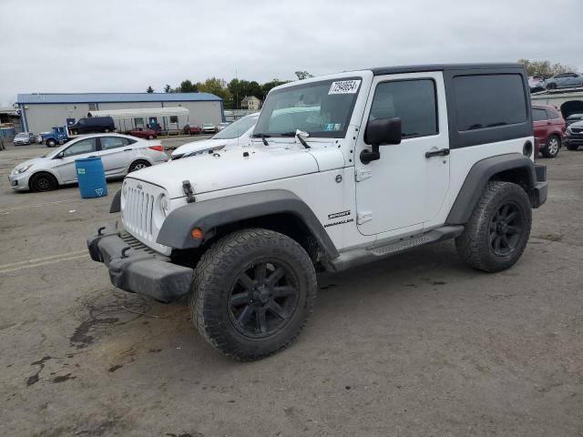 JEEP WRANGLER S 2015 with VIN 1C4AJWAG3FL562207 - Photo from auction