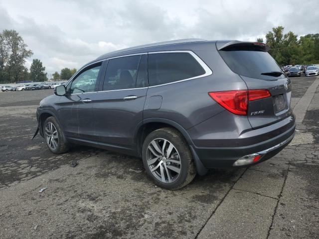 Photo 2 from auction – 2017 HONDA PILOT TOUR with VIN 5FNYF6H90HB087323