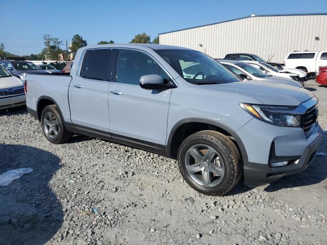 Photo 4 from auction – 2023 HONDA RIDGELINE with VIN 5FPYK3F78PB034273