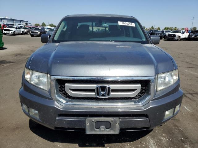 Photo 5 from auction – 2011 HONDA RIDGELINE with VIN 5FPYK1F57BB006380