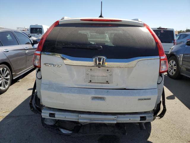 Photo 6 from auction – 2016 HONDA CR-V TOURI with VIN 5J6RM3H95GL021252