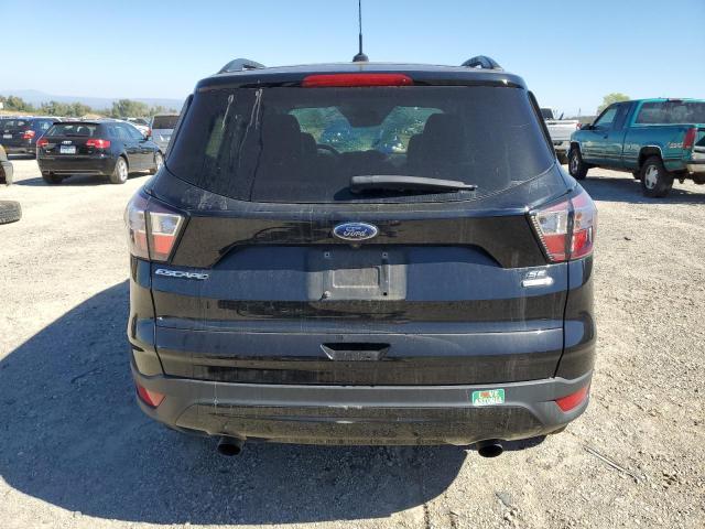 Photo 6 from auction – 2018 FORD ESCAPE SE with VIN 1FMCU9GDXJUC60698