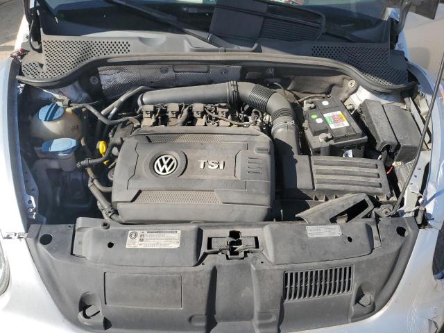 Photo 11 from auction – 2014 VOLKSWAGEN BEETLE with VIN 3VWF17AT0EM642115