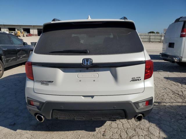 Photo 6 from auction – 2022 HONDA PASSPORT E with VIN 5FNYF8H04NB006462