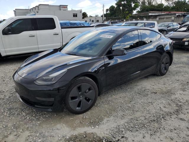 TESLA MODEL 3 2023 with VIN 5YJ3E1EA7PF424129 - Photo from auction