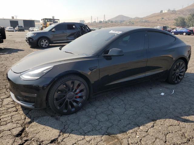 TESLA MODEL 3 2022 with VIN 5YJ3E1EC4NF209306 - Photo from auction