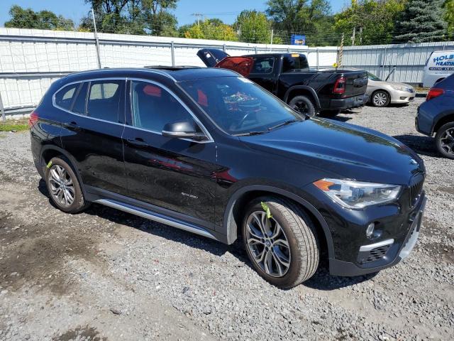 Photo 4 from auction – 2017 BMW X1 XDRIVE2 with VIN WBXHT3C32H5F85069