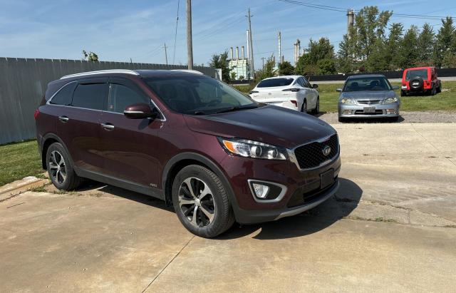 KIA SORENTO EX 2016 with VIN 5XYPHDA56GG176371 - Photo from auction