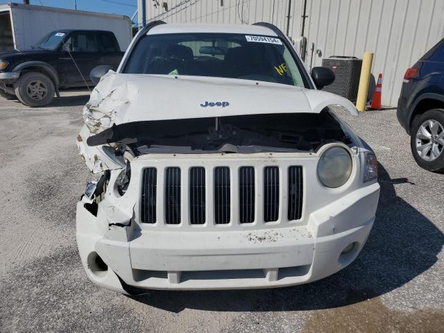 Photo 5 from auction – 2010 JEEP COMPASS LA with VIN 1J4NT4FB5AD553454