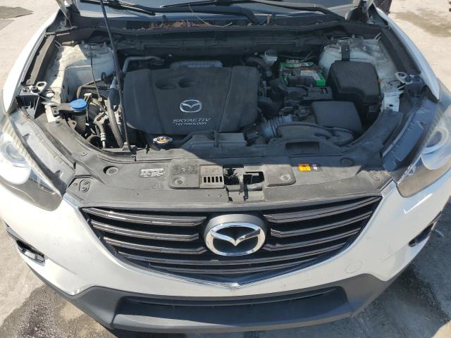 Photo 12 from auction – 2016 MAZDA CX-5 TOURI with VIN JM3KE2CY6G0890965