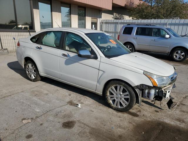 Photo 4 from auction – 2011 FORD FOCUS SEL with VIN 1FAHP3HN8BW111837