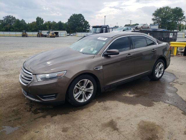 FORD TAURUS SEL 2015 with VIN 1FAHP2H84FG110740 - Photo from auction