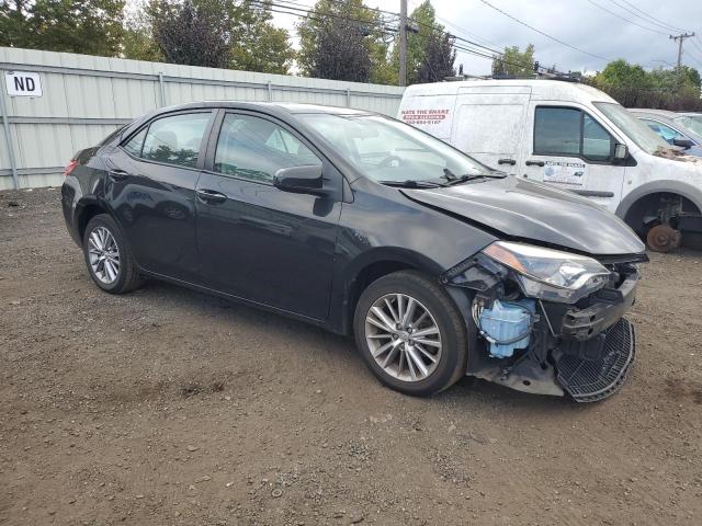 Photo 4 from auction – 2014 TOYOTA COROLLA L with VIN 2T1BURHE5EC064923