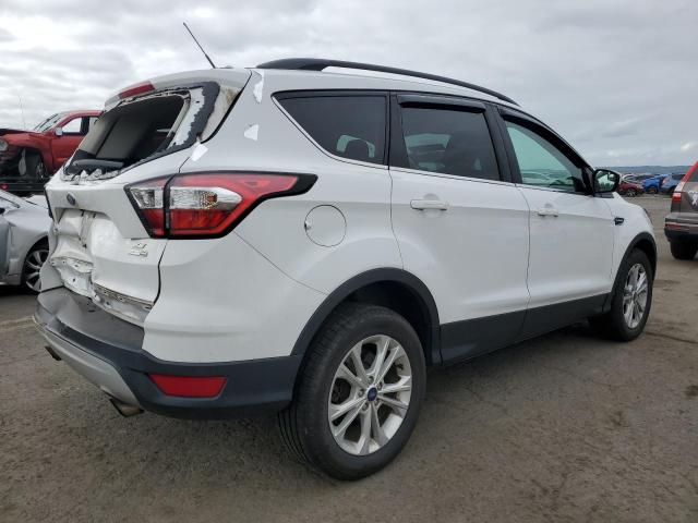 Photo 3 from auction – 2018 FORD ESCAPE with VIN 1FMCU9GD6JUD13638