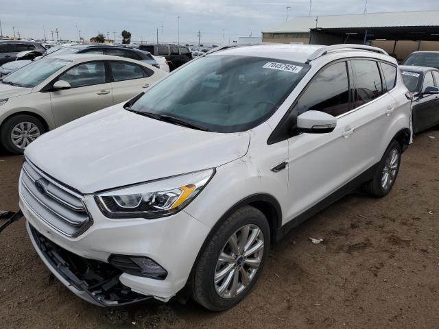 FORD ESCAPE TIT 2017 with VIN 1FMCU9JD0HUE67460 - Photo from auction