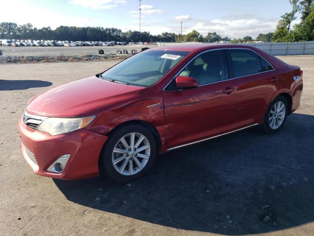 TOYOTA CAMRY HYBR 2012 with VIN 4T1BD1FK6CU060174 - Photo from auction