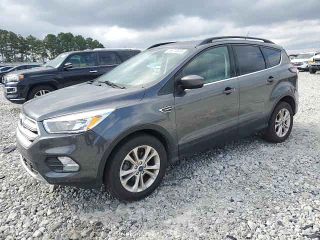 FORD ESCAPE SE 2018 with VIN 1FMCU0GDXJUB46115 - Photo from auction