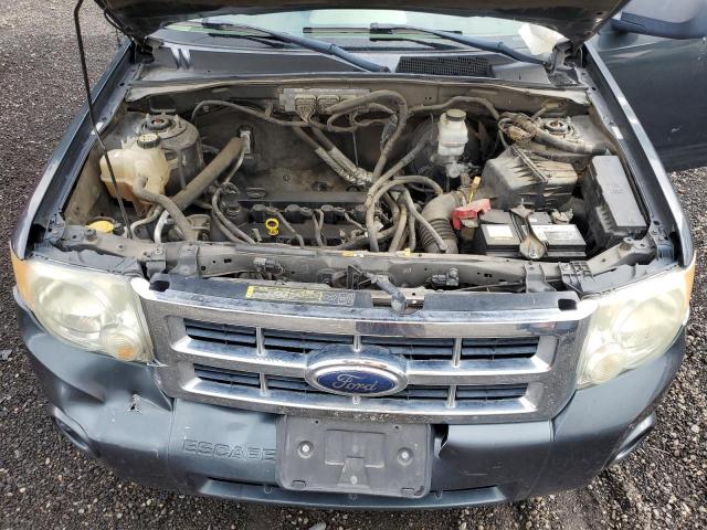 Photo 12 from auction – 2009 FORD ESCAPE XLS with VIN 1FMCU02779KB87052