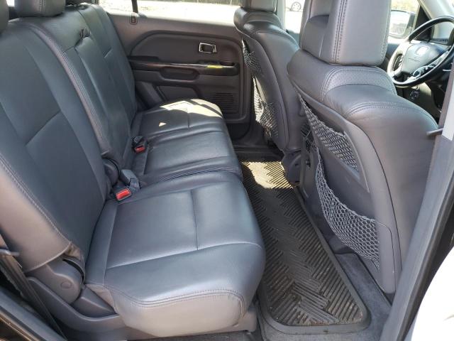 Photo 11 from auction – 2004 HONDA PILOT EXL with VIN 2HKYF18664H608890