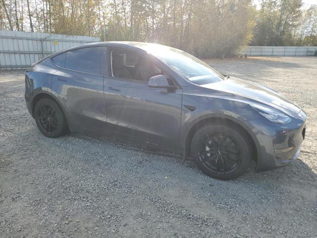 Photo 4 from auction – 2022 TESLA MODEL Y with VIN 7SAYGDEE7NF460553