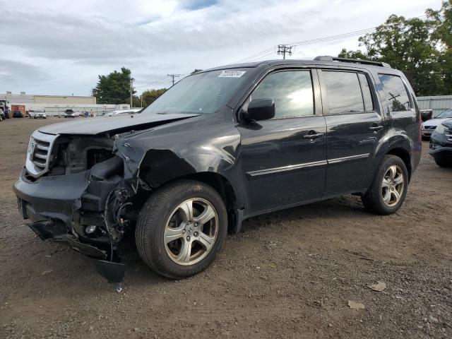 HONDA PILOT EXL 2014 with VIN 5FNYF4H59EB020510 - Photo from auction