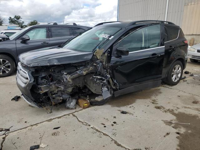 FORD ESCAPE SE 2017 with VIN 1FMCU9GD8HUC63108 - Photo from auction