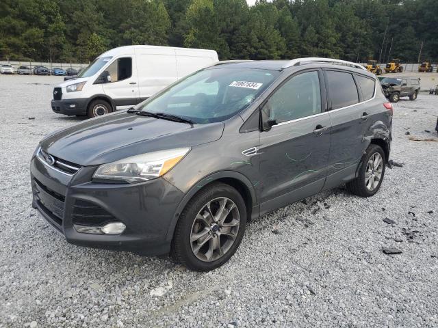 FORD ESCAPE TIT 2016 with VIN 1FMCU0JX1GUC40668 - Photo from auction