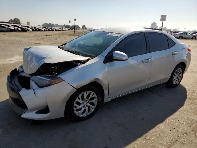 TOYOTA COROLLA L 2018 with VIN 2T1BURHE2JC009789 - Photo from auction