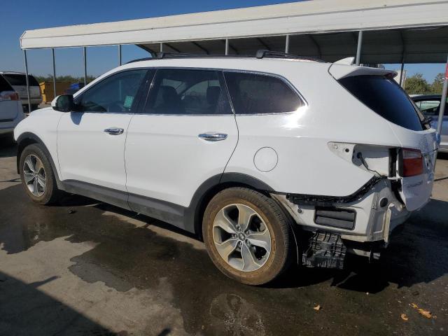 Photo 2 from auction – 2014 HYUNDAI SANTA FE G with VIN KM8SM4HF2EU080264