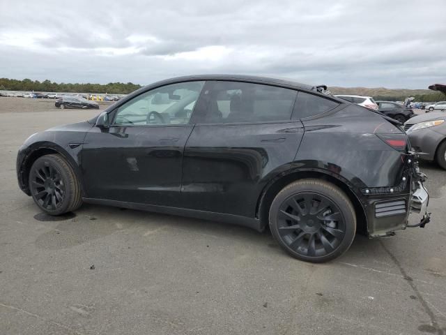 Photo 2 from auction – 2023 TESLA MODEL Y with VIN 7SAYGDEE2PA181415