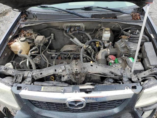 Photo 11 from auction – 2008 MAZDA TRIBUTE I with VIN 4F2CZ02Z48KM14736