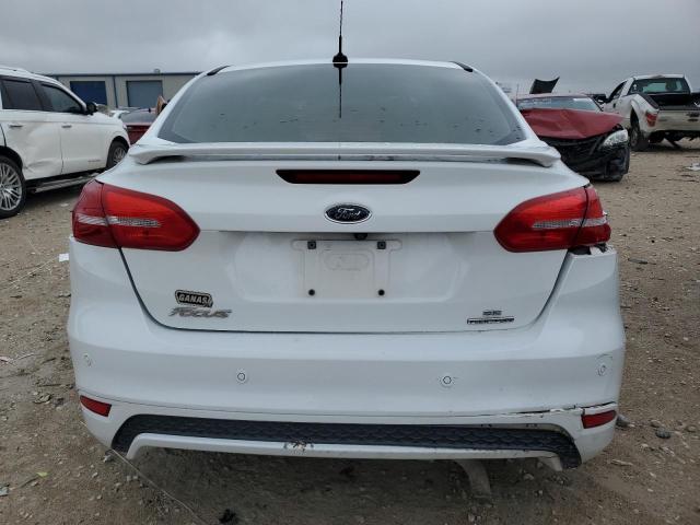 Photo 6 from auction – 2015 FORD FOCUS SE with VIN 1FADP3F23FL386028