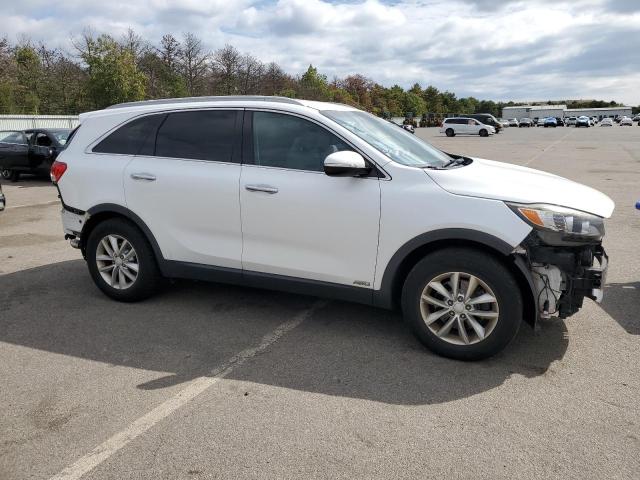 Photo 4 from auction – 2016 KIA SORENTO LX with VIN 5XYPGDA31GG021373