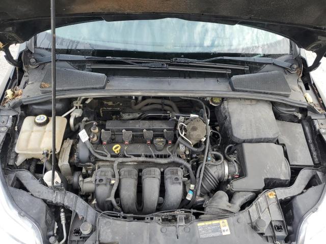 Photo 11 from auction – 2013 FORD FOCUS SE with VIN 1FADP3F20DL332473