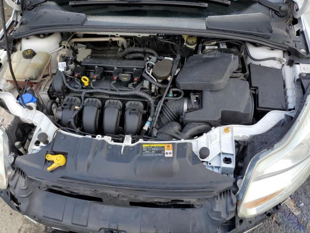 Photo 11 from auction – 2014 FORD FOCUS SE with VIN 1FADP3F22EL260967