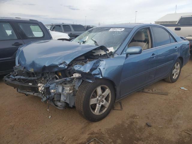 TOYOTA CAMRY LE 2003 with VIN 4T1BF32K53U563352 - Photo from auction