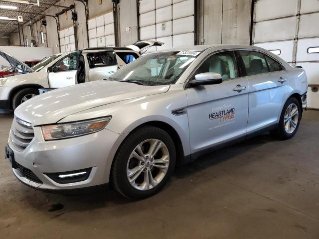 FORD TAURUS SEL 2014 with VIN 1FAHP2E80EG125691 - Photo from auction