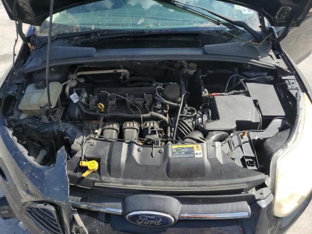 Photo 11 from auction – 2014 FORD FOCUS SE with VIN 1FADP3F23EL257818