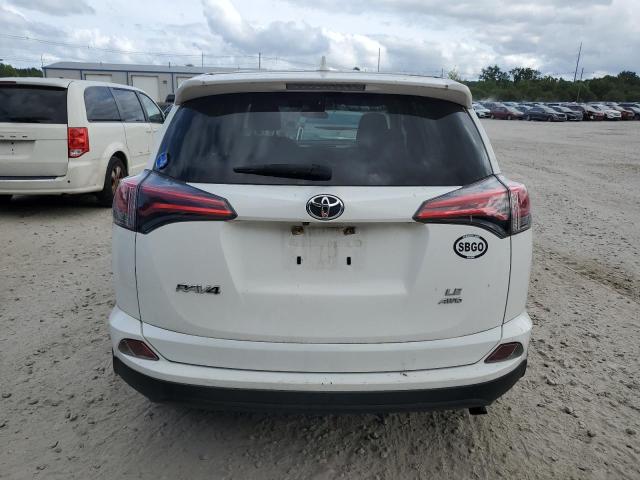 Photo 6 from auction – 2018 TOYOTA RAV4 LE with VIN JTMBFREV2JJ721027