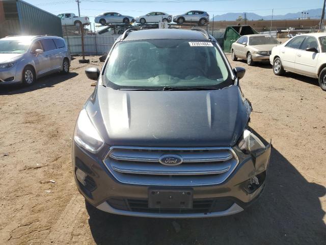 Photo 5 from auction – 2018 FORD ESCAPE SE with VIN 1FMCU9G90JUB48472