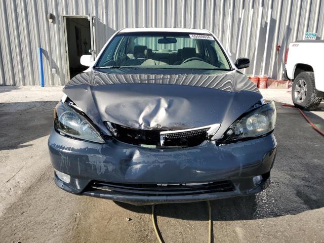 Photo 5 from auction – 2004 TOYOTA CAMRY LE with VIN JTDBE32K640280457