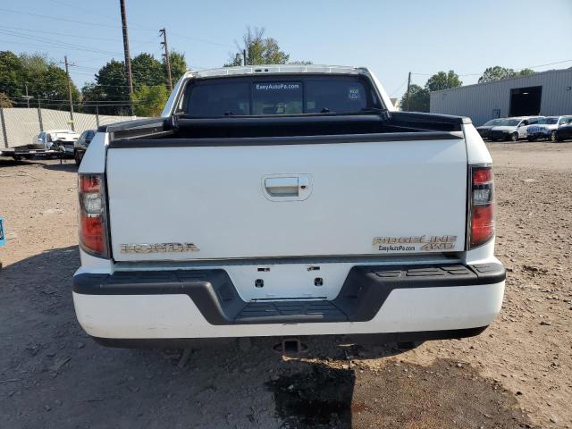 Photo 6 from auction – 2014 HONDA RIDGELINE with VIN 5FPYK1F54EB002033