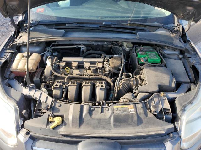 Photo 11 from auction – 2013 FORD FOCUS SE with VIN 1FADP3F20DL372956