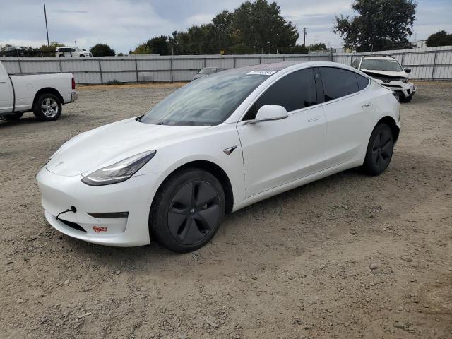 TESLA MODEL 3 2018 with VIN 5YJ3E1EA8JF014883 - Photo from auction